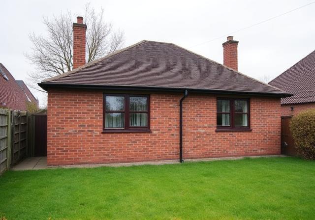 A single-storey brick house. Before extension.
